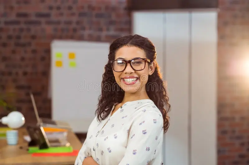 Vtiger WooCommerce integration 26 african american woman standing desk workspace using laptop holding mug near whiteboard african american woman standing 385038364